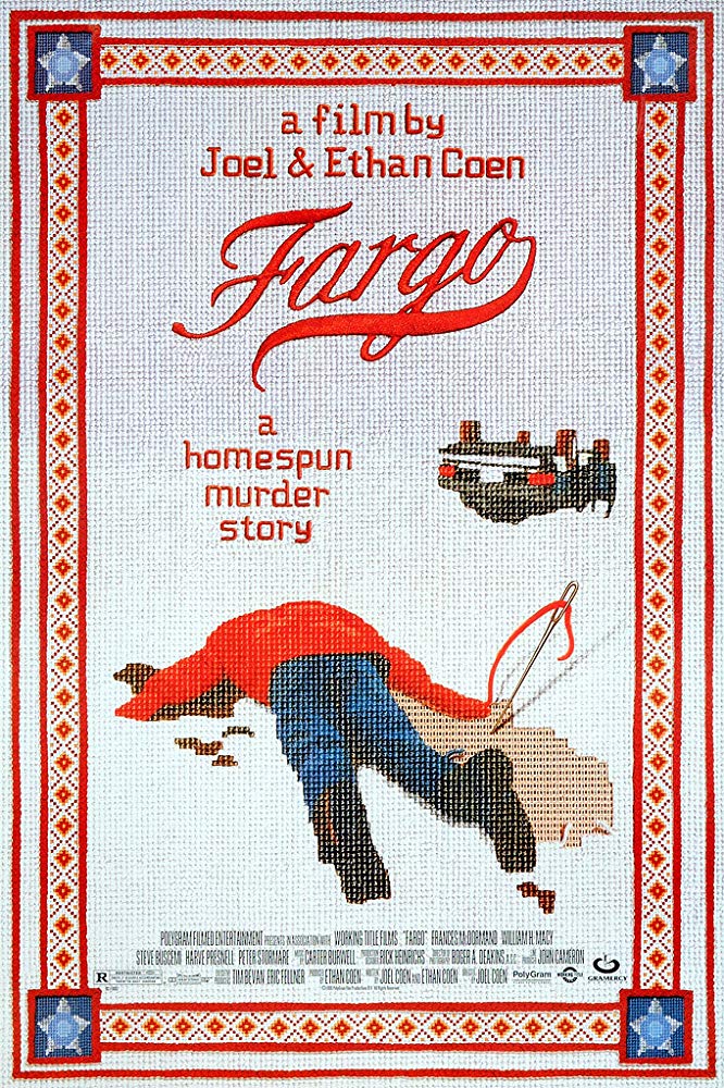 A cross stitch rendering of a man lying facedown on the snow with blood coming out of him
