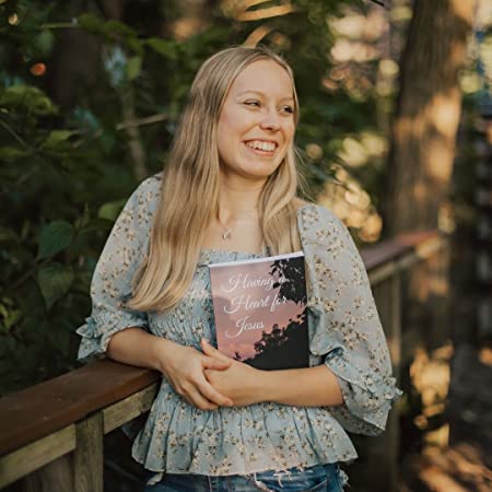 Picture of author Morgan Faith holding her book, Having a Heart for Jesus