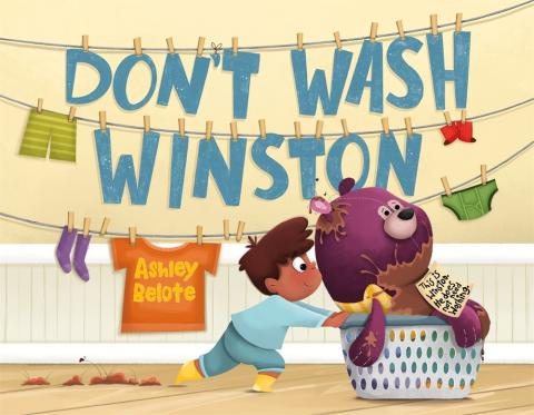Book cover with a child pushing a teddy bear in a laundry basket