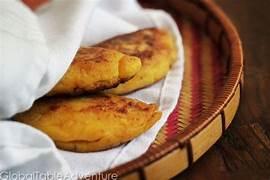 plantain dough fried around melty cheese.