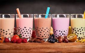 Many flavors of boba tea in glasses