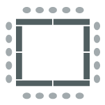 Enclosed square made up of tables with chairs on outside of square